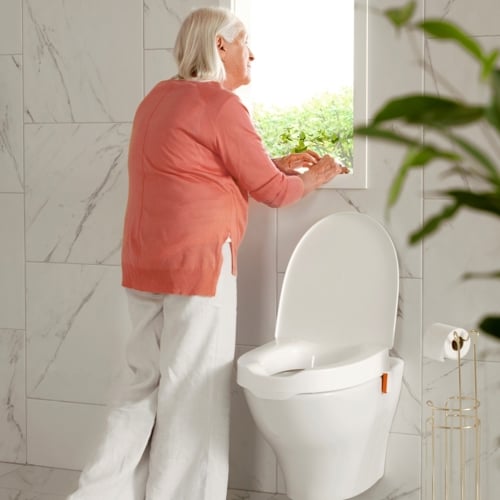 Etac My-Loo with brackets woman by the window web